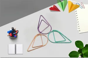 Detailed view of colorful teardrop-shaped metal paperclips for creative stationery use
