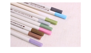 Close-up of multicolor metallic brush pen set with soft tips for DIY hand lettering