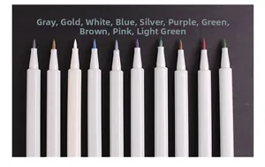 Macro view of 10 metallic brush markers showing vibrant ink coverage on black paper