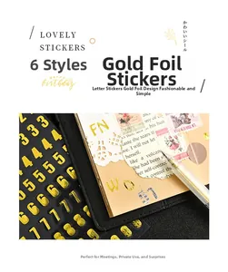 Macro detail of gold hot stamping alphabet and number stickers for DIY crafts
