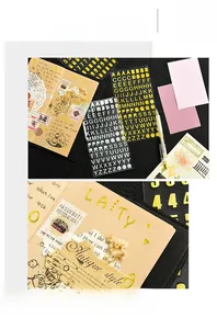 Detail of bronzing alphabet and number stickers for creative DIY stationery projects