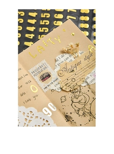 Detail of metallic gold foil alphabet and number stickers for creative DIY scrapbooking