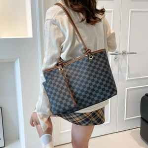 Stylish checkered tote bag set with brown leather straps and matching inner pouch for women