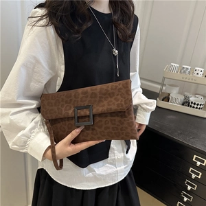 Brown leopard print envelope clutch bag with square buckle and wrist strap