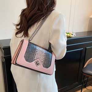 Chic pink shoulder bag with snake pattern texture and metal chain strap for women