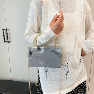 Mode acryl marmeren avondclutch met gouden handvat en metalen ketting schouderriem