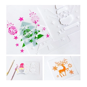 Détail des pochoirs sapin et renne avec coloriage créatif sur papier blanc pour enfants