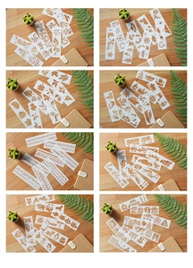Macro view of long flexible hollow drawing stencils with floral and letter patterns