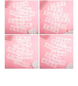 Close-up of flexible white plastic stencils with cartoon patterns for DIY scrapbooking