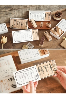 Detailed view of vintage herbarium wooden stamps with floral patterns for journaling