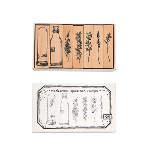 7-piece set of retro botanical wooden stamps with herbarium patterns in a white gift box