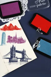 Detailed view of colorful water-based pigment ink stamp pads for DIY craft journaling