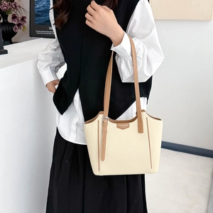 Retro large capacity tote bag in cream and brown with adjustable straps for daily commute
