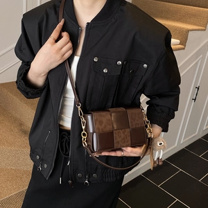 Retro woven leather crossbody bag with leopard accents and golden chain strap for women