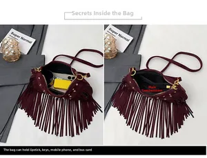 Detailed view of burgundy suede bag interior showing main pocket storage capacity
