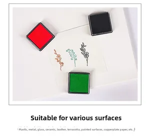 Detailed view of red, black, and green ink pads used on various surfaces like paper and glass