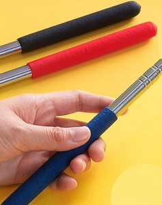 Detail of extendable stainless steel pointer with multi-color non-slip sponge handles