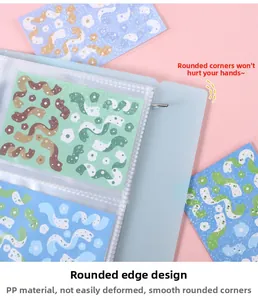 Close-up of light blue PP card binder with rounded corners and transparent inner sleeves