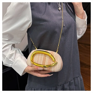 Fashionable straw box wristlet bag with round metal handle and gold chain strap details