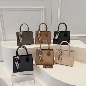 Minimalist luxury handbag in six colors with woven texture and detachable strap