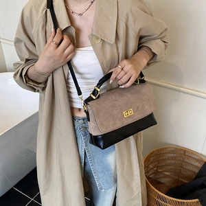 Chic two-tone quilted leather handbag with gold lock and chain strap for women