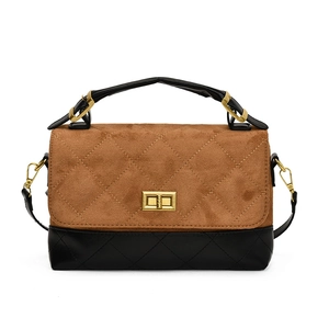 Quilted two-tone shoulder bag with brown suede and black leather, featuring gold lock