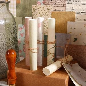 Set de papel vintage para scrapbooking de jardín con flores y texturas de partituras
