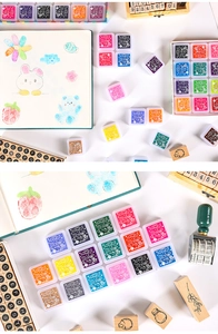 Detailed set of 24 colorful ink pads with transparent lids and creative stamp art tools