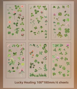 Detail of vintage flower and clover PVC stickers for scrapbooking, set of 6 sheets