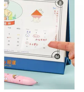 Detail showing hand writing on cute colorful PET sticky notes with transparent index tabs