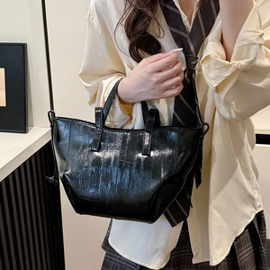 Glossy black tote bag with side ties for women, stylish large capacity commuter shoulder bag
