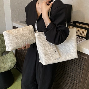 White woven leather tote bag set including a large shopper and a matching clutch