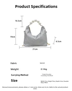 Silver snakeskin textured bag with pearl handle and detailed size measurements chart