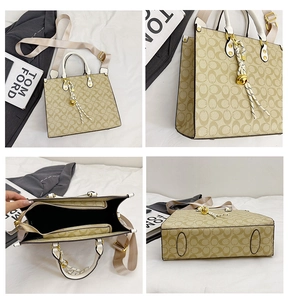 Detailed views of vintage tote bag showing compartments, monogram print, and base stitching