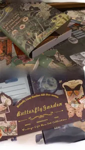 Close-up of vintage Butterfly Garden stationery set with gold foil detailing