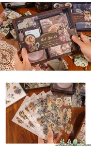 Detailed vintage stationery set with angel stickers and antique style scrapbooking tools