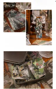Detail of vintage junk journal set with butterfly stickers and decorative paper in tin box