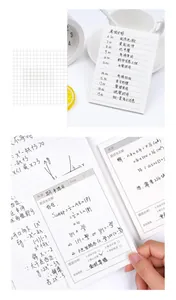 Detailed view of grid pages and ruled sticky notes for student correction and study planning