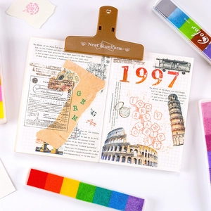 Brown long tail binder clip with Neat and Uniform print for DIY scrapbooking and office use
