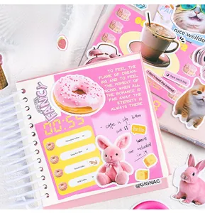Cute cartoon animal stickers on a white notebook with cat and rabbit DIY scrapbooking