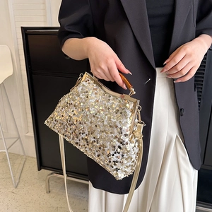 Borsa da sera con paillettes dorate con manico in resina e tracolla da donna