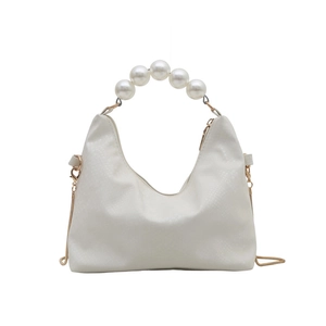 White half-moon crossbody bag with snakeskin texture and elegant pearl handle