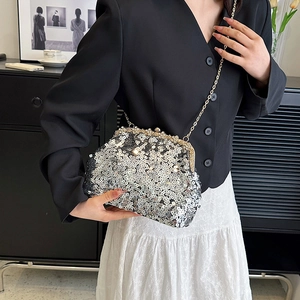 Sparkly silver sequin shell evening bag with pearl top handle and golden chain strap