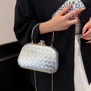Silver woven evening clutch bag with gold chain strap and elegant top handle