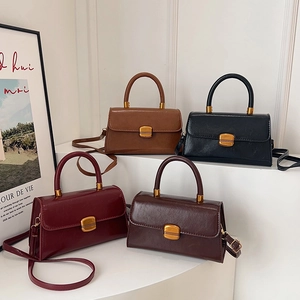 Bolsos cuadrados vintage de cuero encerado en colores burdeos, café, negro y camel