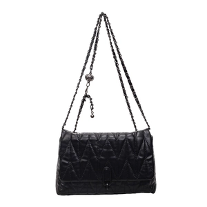 Elegant black chevron quilted leather crossbody bag with adjustable gold chain strap