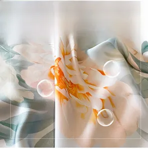 Close-up of floral print satin fabric showing silky texture and vibrant orange flowers