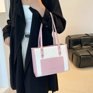 Minimalist large capacity tote bag in pink and white checkerboard pattern on black coat