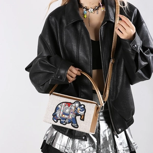Ethnic embroidery elephant box bag with white woven texture and brown leather strap