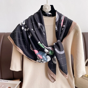 Elegant floral print square silk scarf in black with modern geometric patterns and trim